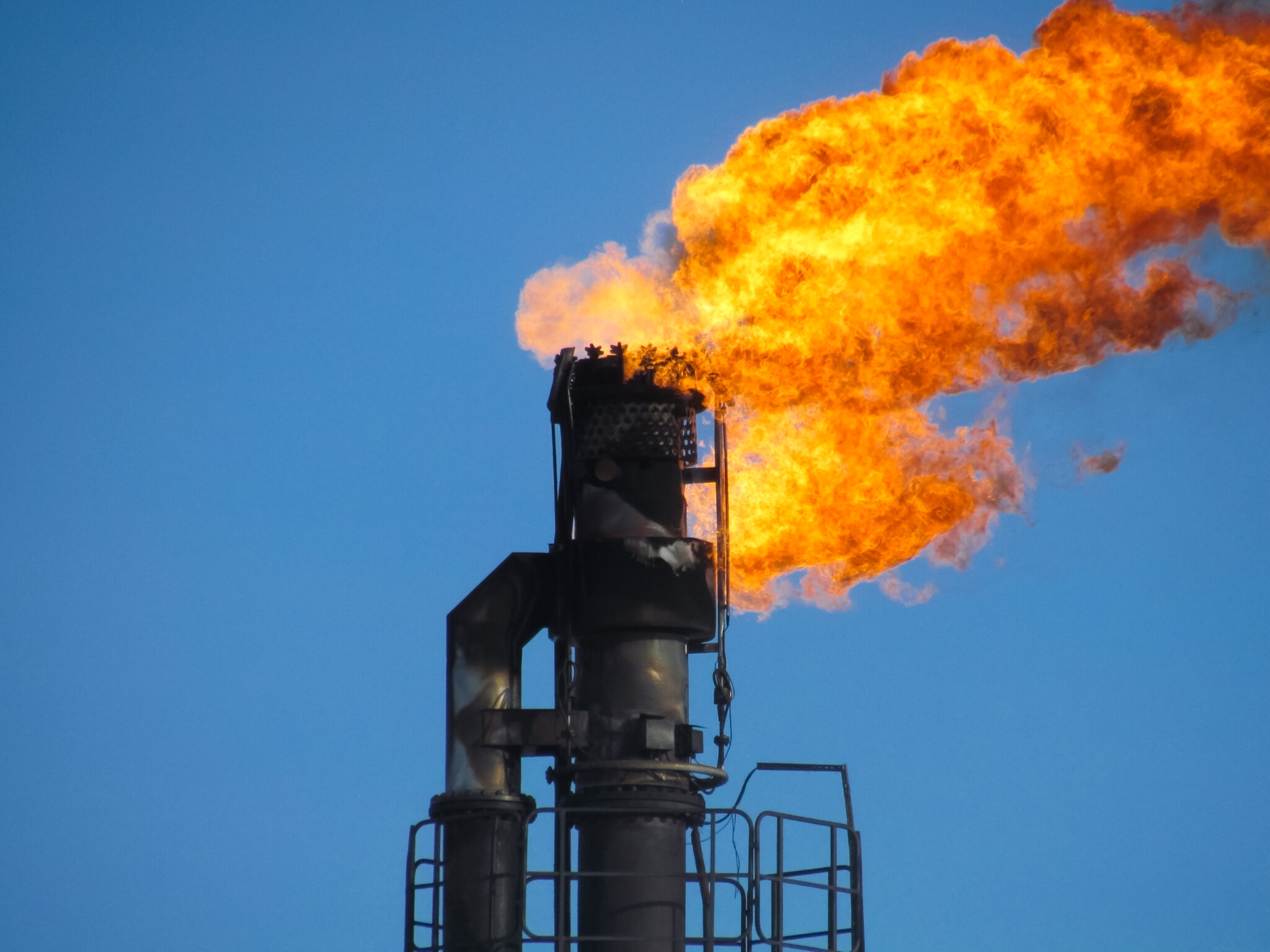 System of a torch on an oil field. Burning through a torch head.